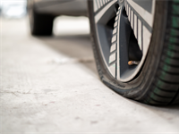 What to do in case of flat tire?